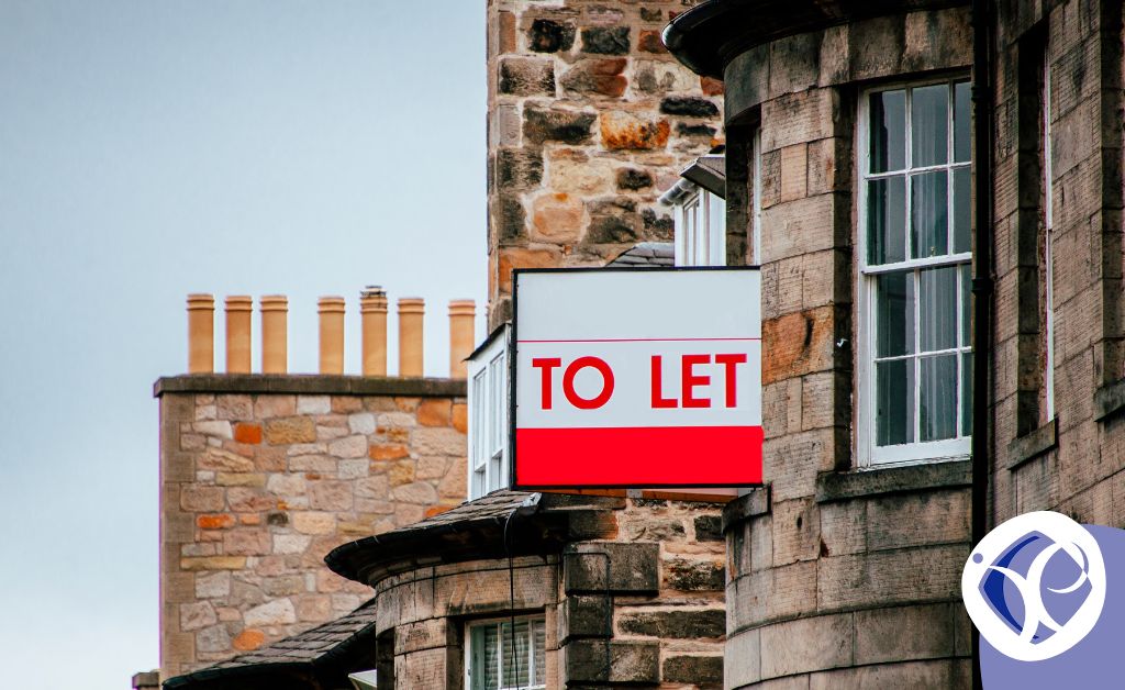An image demonstrating tax on buy-to-let properties: a 'to let' sign is attached to the curved bay window of a stone house.